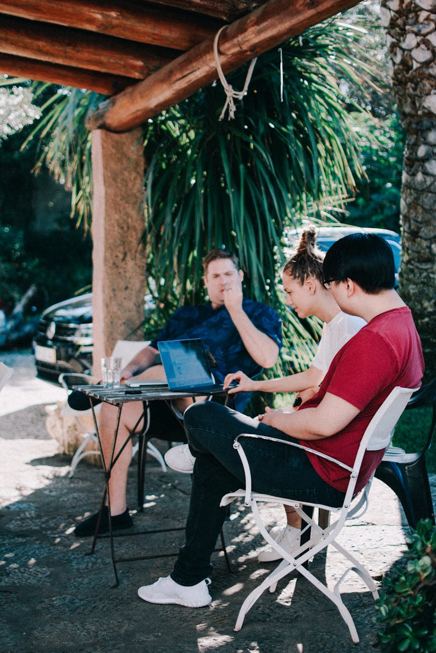 men and woman sitting in front of table